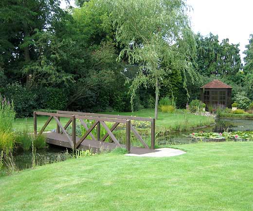 Wooden bridge over pond ( aquapic)