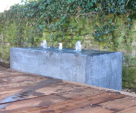 Brimming water trough feature ( aquapic)